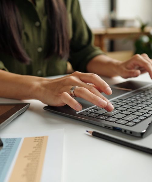 Hand,Of,Young,Female,Teacher,Or,Student,Typing,On,Laptop